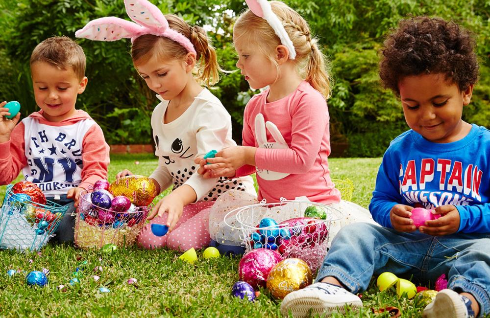 children playing with easter eggs