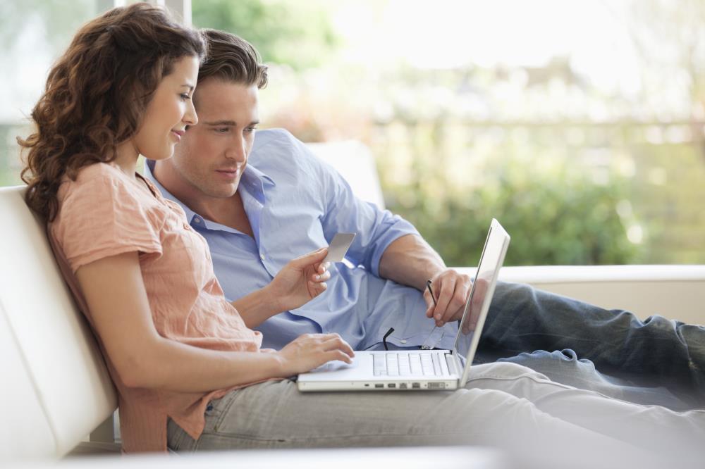couple looking at laptop