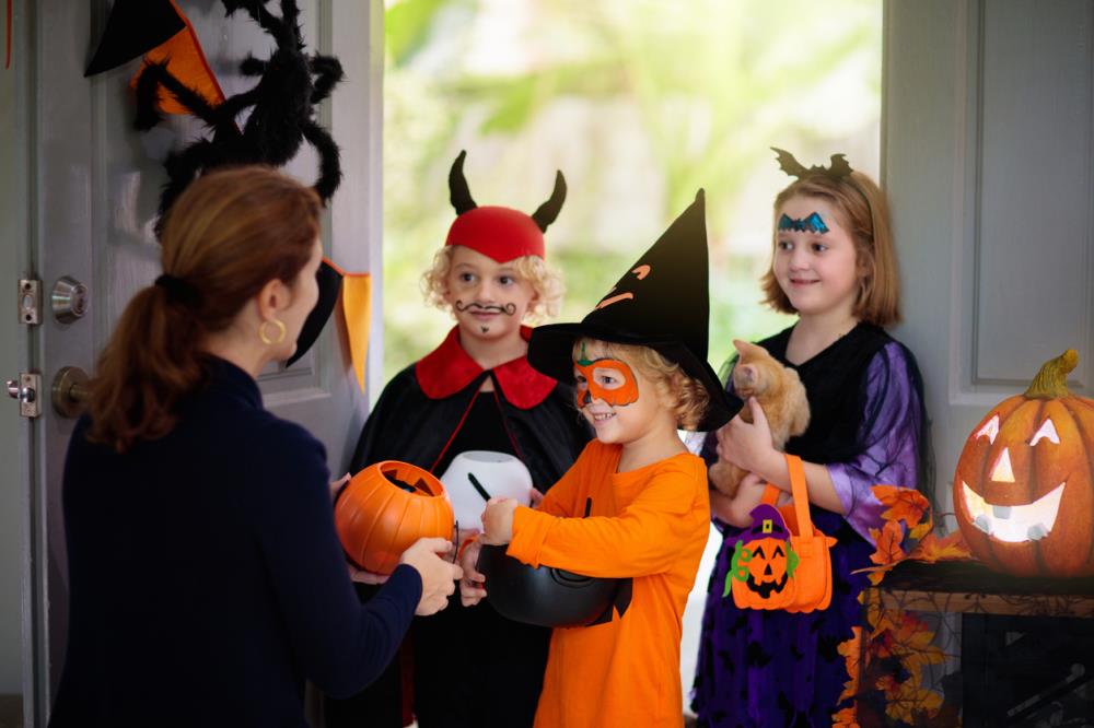 children in costume trick or treating